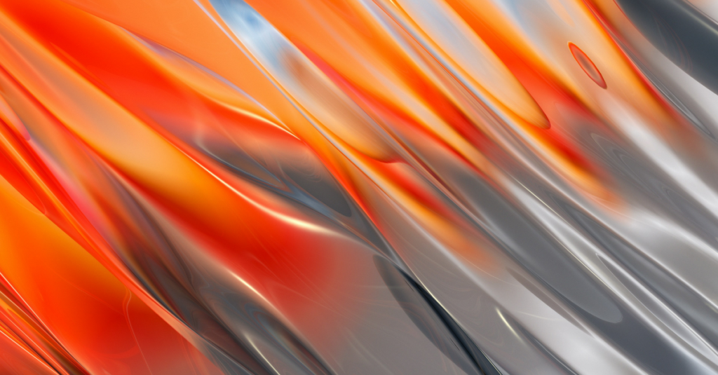 Abstract close-up of orange and silver metallic ribbons with glossy, flowing shapes.