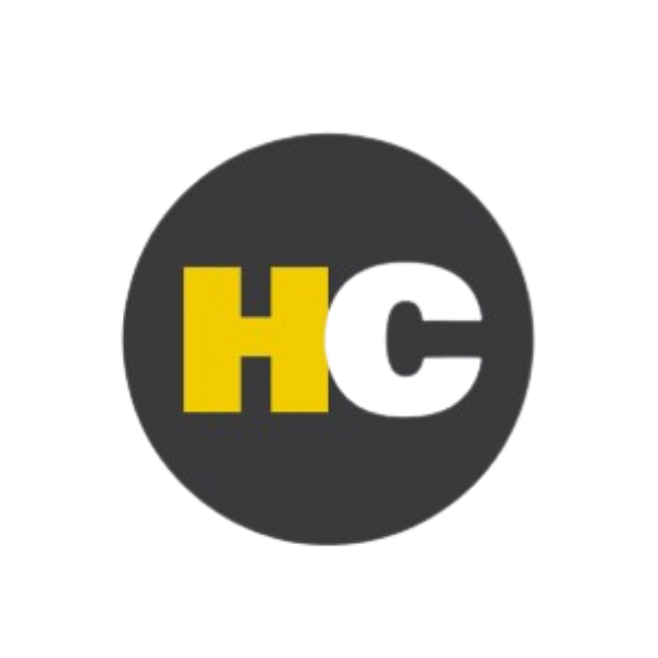 Circular dark gray logo with a yellow H and white C in the center.